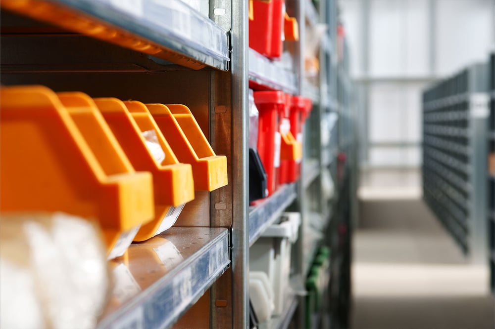 Storage bins and racks in an industrial warehouse